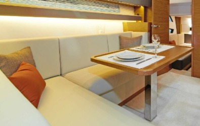 Bavaria S45 COUPE dining area featuring a large sofa and table